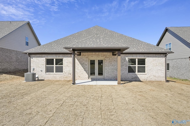 177 Pennington Ave, Huntsville, AL 35811 - rear view of house featuring french doors, roof with shingles, and brick siding