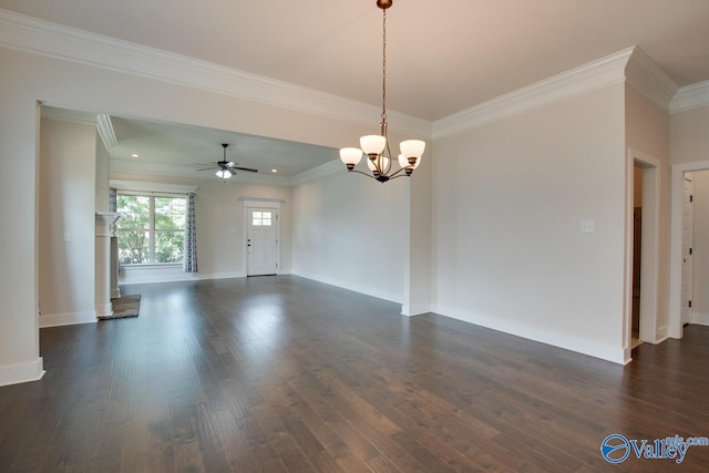 unfurnished room featuring dark wood-type flooring, crown molding, and ceiling fan with notable chandelier