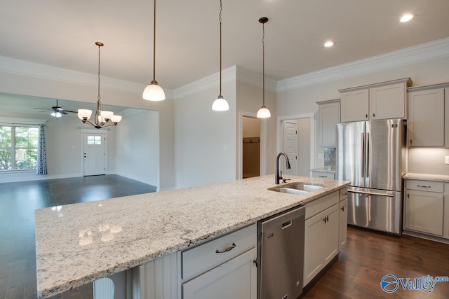 kitchen featuring stainless steel appliances, a kitchen island with sink, and dark wood-type flooring