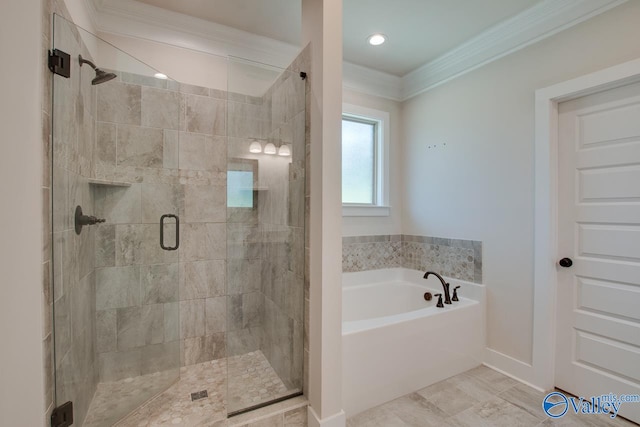 bathroom featuring separate shower and tub and crown molding