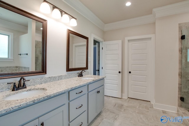 bathroom with a shower with door, vanity, and ornamental molding