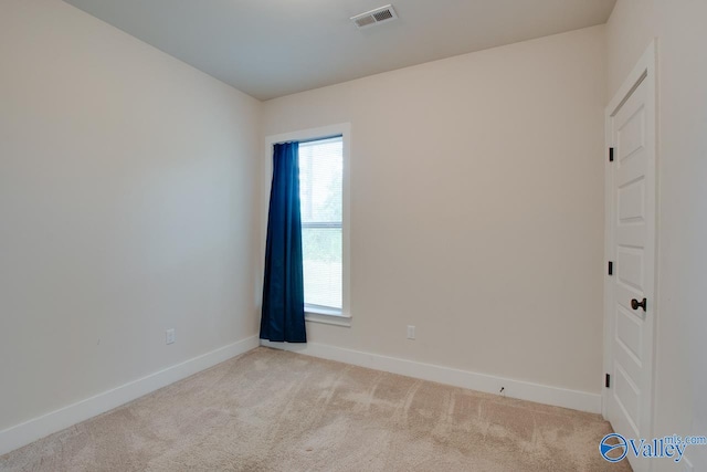 view of carpeted spare room