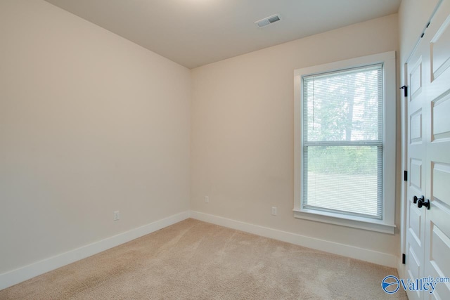 view of carpeted spare room