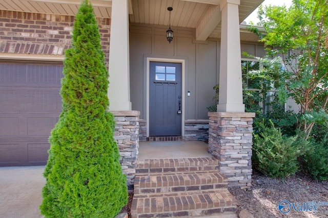 property entrance with a garage