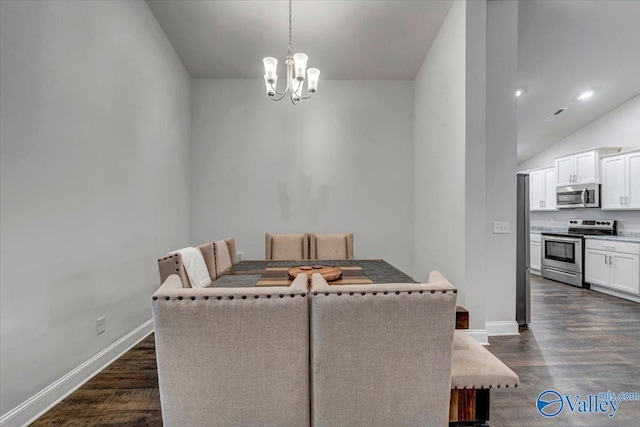 dining space featuring a notable chandelier, dark wood-type flooring, and baseboards