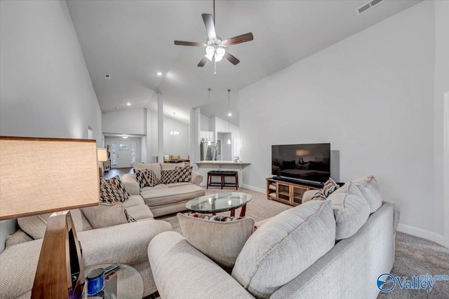 living room with ceiling fan, baseboards, visible vents, and light carpet