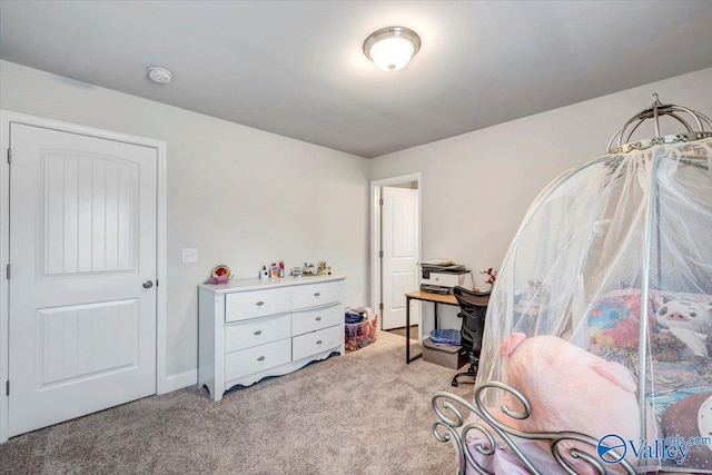 bedroom featuring light colored carpet