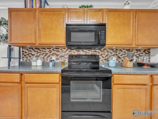 kitchen featuring tasteful backsplash, tile patterned flooring, and black appliances