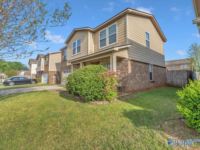 view of home's exterior featuring a yard, brick siding, and fence