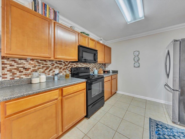 kitchen with backsplash, baseboards, black appliances, and crown molding