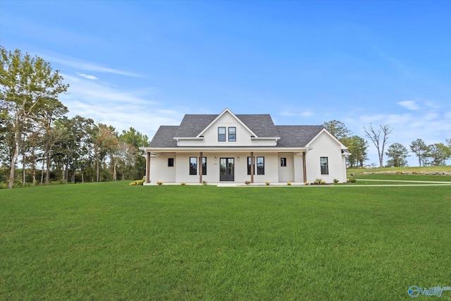 modern inspired farmhouse featuring a front lawn and a porch