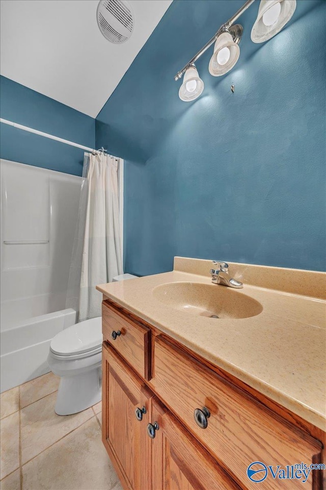 bathroom featuring tile patterned floors, toilet, vanity, shower / bath combo, and visible vents