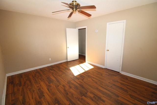 unfurnished bedroom with dark wood-type flooring and ceiling fan