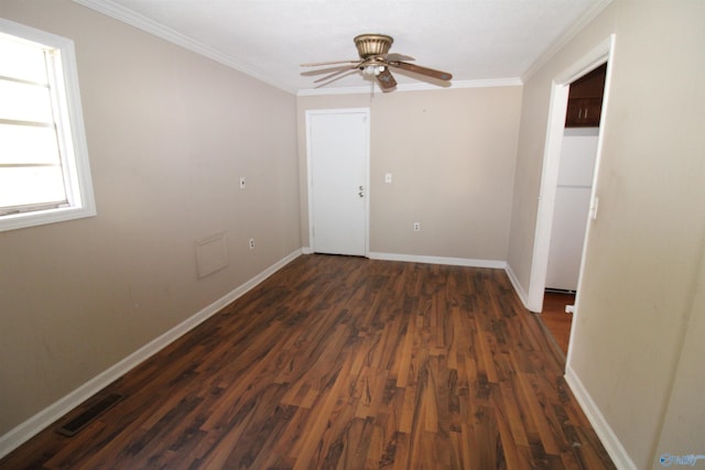 unfurnished room with dark hardwood / wood-style flooring, crown molding, and ceiling fan