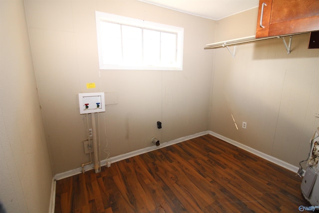 clothes washing area featuring dark wood-type flooring and hookup for a washing machine