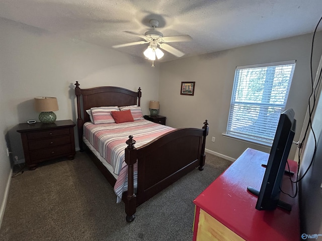 carpeted bedroom with a textured ceiling and ceiling fan