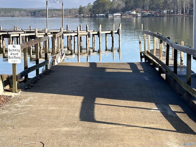 view of dock with a water view