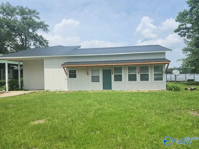 LOT3 County Road 432, Centre, AL 35960 - back of property featuring board and batten siding, a yard, and metal roof