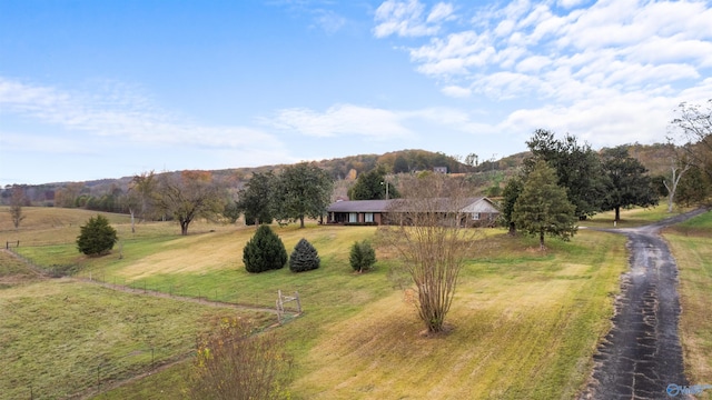 exterior space with a rural view