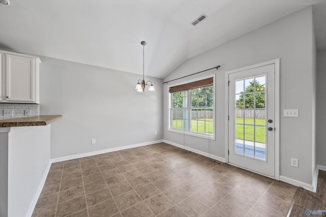 377 Robinson Rd, Huntsville, AL 35811 - unfurnished dining area with lofted ceiling and a chandelier