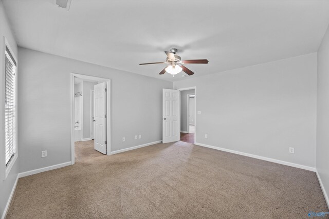 377 Robinson Rd, Huntsville, AL 35811 - unfurnished bedroom featuring carpet floors, ceiling fan, and connected bathroom