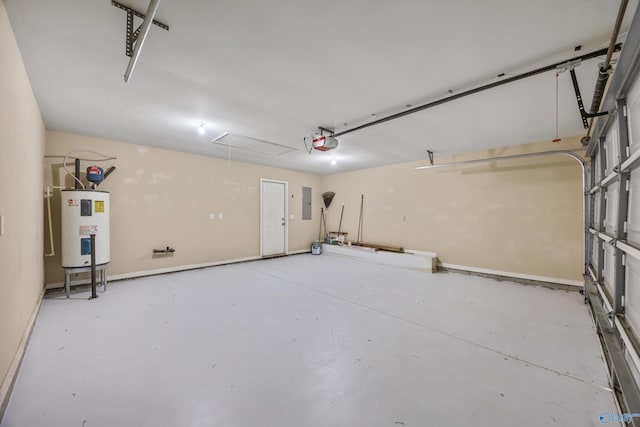 377 Robinson Rd, Huntsville, AL 35811 - garage with electric water heater, a garage door opener, and electric panel