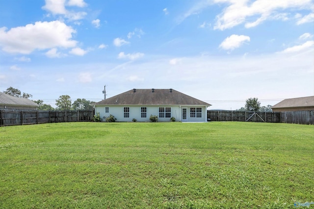 377 Robinson Rd, Huntsville, AL 35811 - rear view of property with a fenced backyard