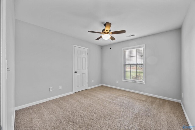 377 Robinson Rd, Huntsville, AL 35811 - unfurnished room featuring a ceiling fan and carpet