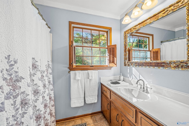 bathroom with vanity and tile patterned floors