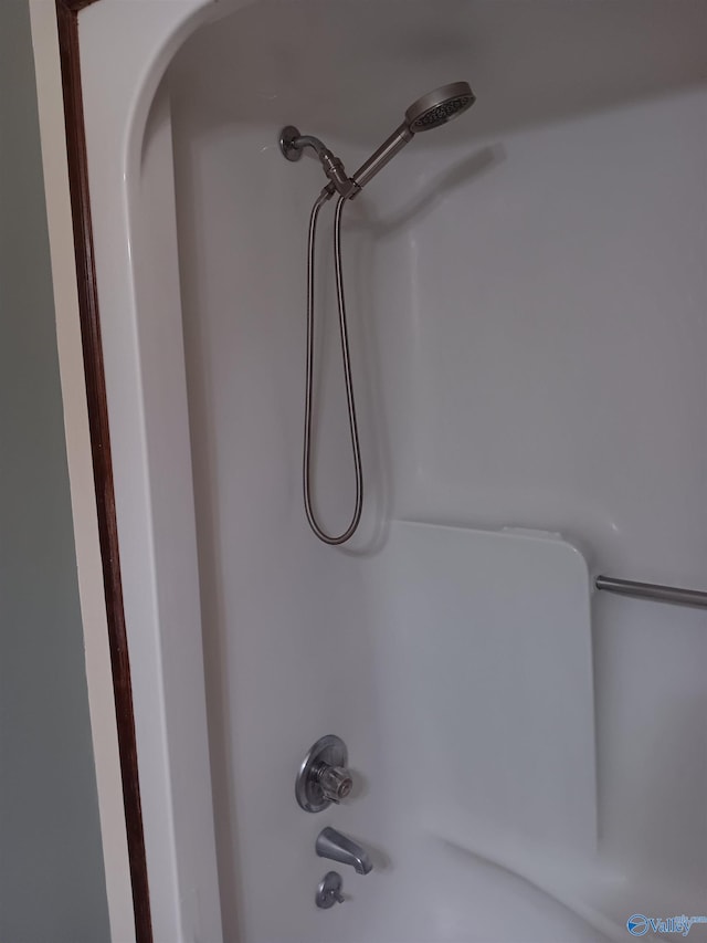 interior details featuring  shower combination