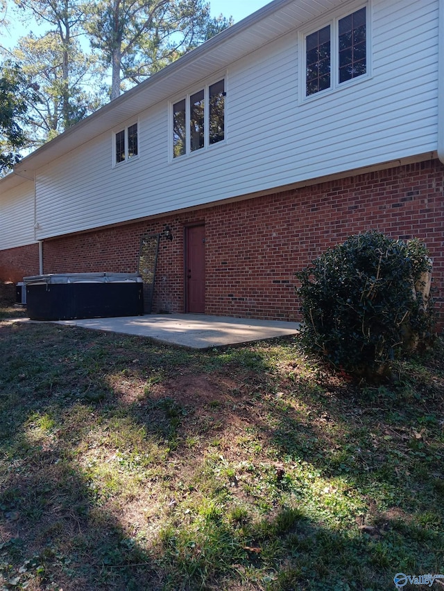 back of house with a patio area