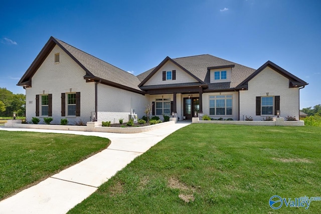 view of front of home with a front lawn