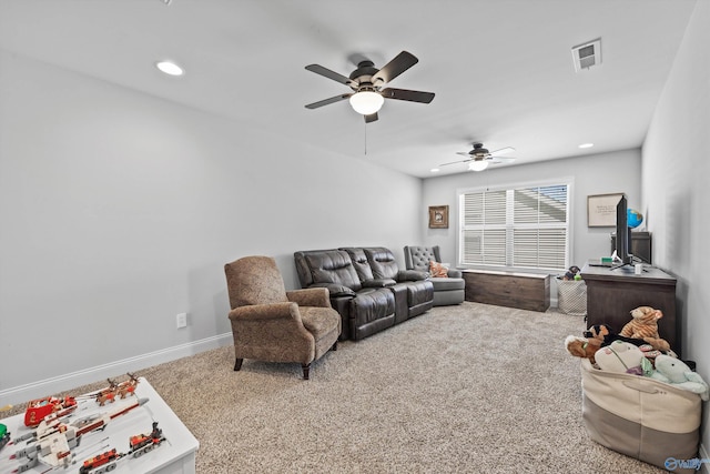 living area with visible vents, baseboards, ceiling fan, recessed lighting, and carpet flooring