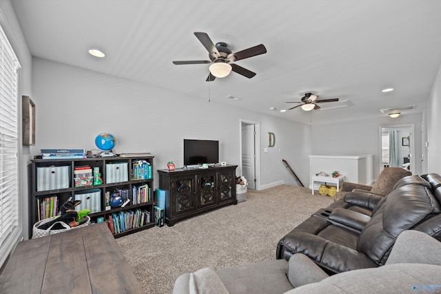 living room featuring baseboards, a ceiling fan, carpet flooring, and recessed lighting