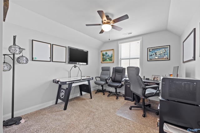 office featuring a ceiling fan, baseboards, visible vents, and vaulted ceiling
