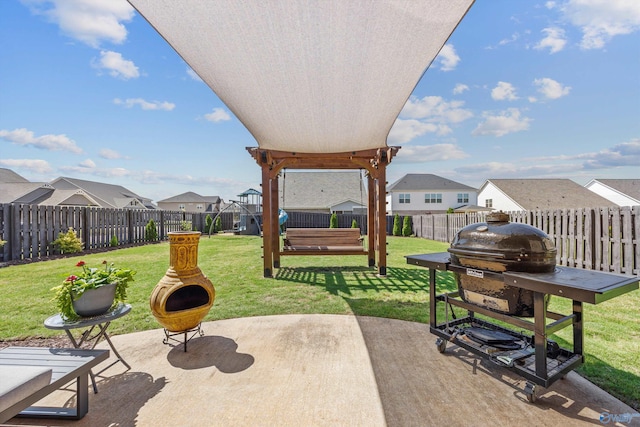 view of patio with a residential view and a fenced backyard