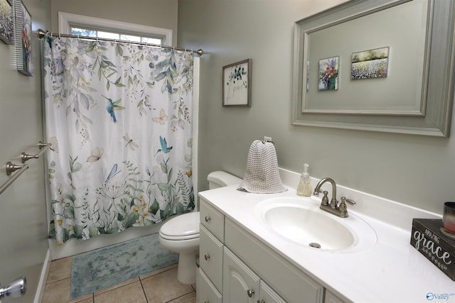 bathroom with tile patterned flooring, toilet, vanity, and shower / bathtub combination with curtain