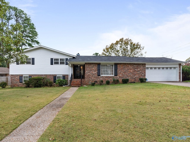 tri-level home with a garage and a front lawn