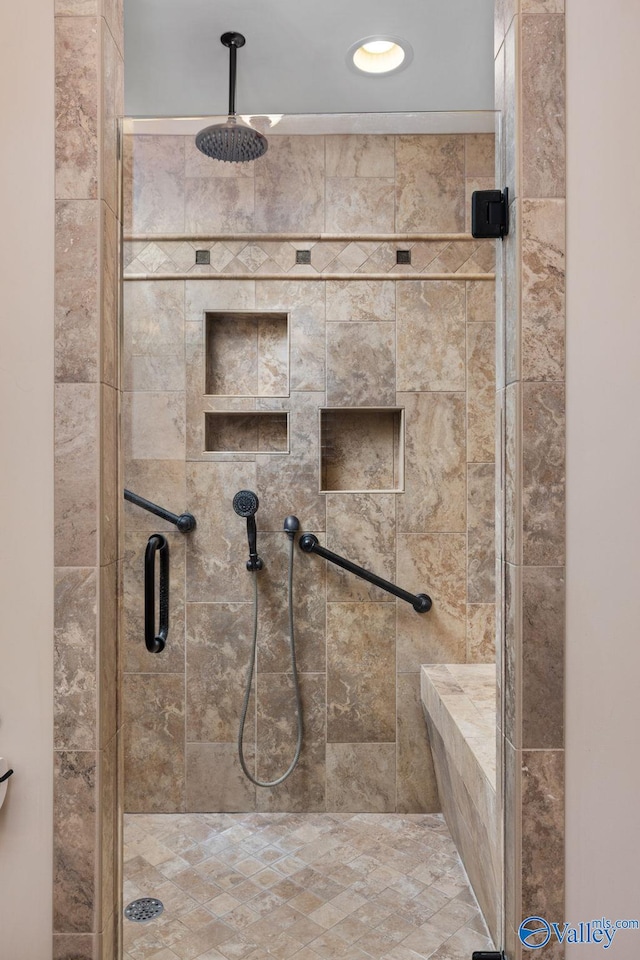 bathroom with a stall shower