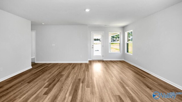 6156 Feather Way SE, Owens Cross Roads, AL 35763 - unfurnished room featuring wood finished floors, baseboards, and recessed lighting