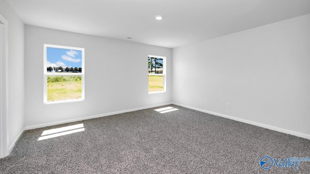 6156 Feather Way SE, Owens Cross Roads, AL 35763 - carpeted empty room featuring baseboards and recessed lighting