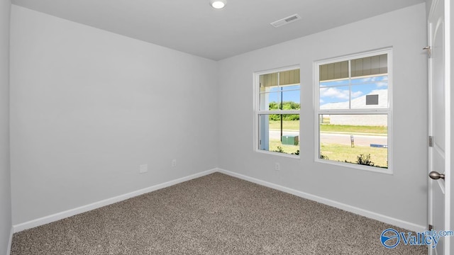 6156 Feather Way SE, Owens Cross Roads, AL 35763 - empty room with carpet floors and baseboards