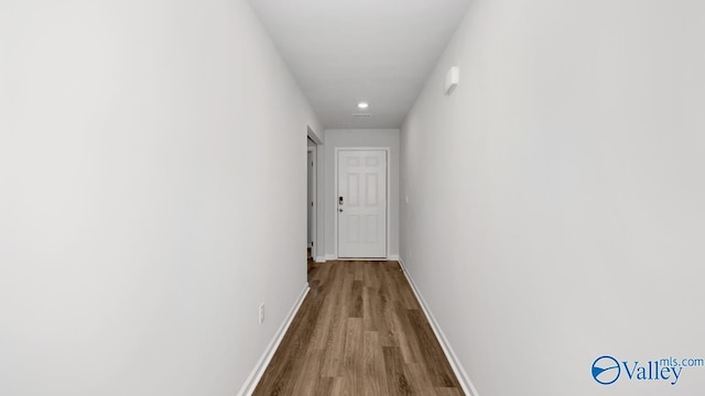 6156 Feather Way SE, Owens Cross Roads, AL 35763 - hallway featuring wood finished floors, baseboards, and recessed lighting