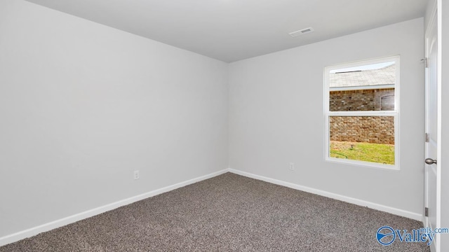 6156 Feather Way SE, Owens Cross Roads, AL 35763 - empty room with carpet floors and baseboards