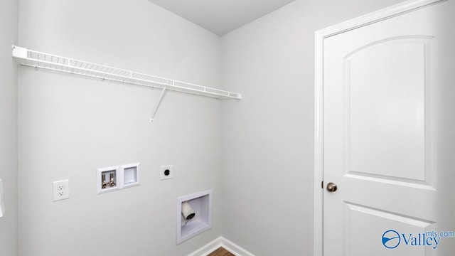 6156 Feather Way SE, Owens Cross Roads, AL 35763 - laundry room featuring electric dryer hookup, hookup for a washing machine, and baseboards