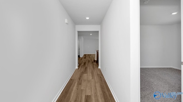 6156 Feather Way SE, Owens Cross Roads, AL 35763 - hallway with recessed lighting, baseboards, and wood finished floors
