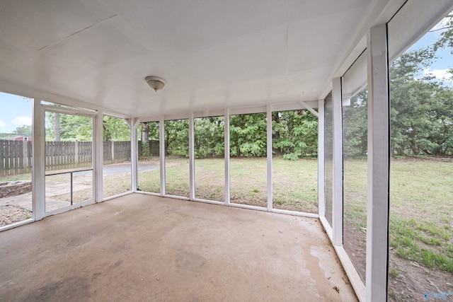 unfurnished sunroom with a wealth of natural light