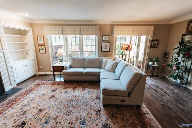 235 Inverness Dr Unit 235, Huntsville, AL 35802 - living area with baseboards, built in shelves, ornamental molding, and dark wood finished floors