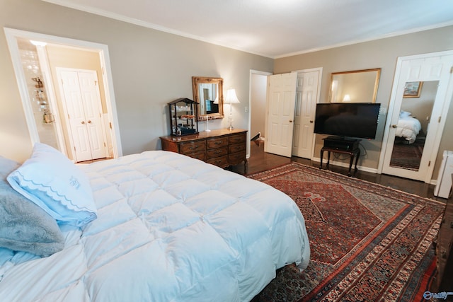 235 Inverness Dr Unit 235, Huntsville, AL 35802 - bedroom featuring crown molding, baseboards, and wood finished floors