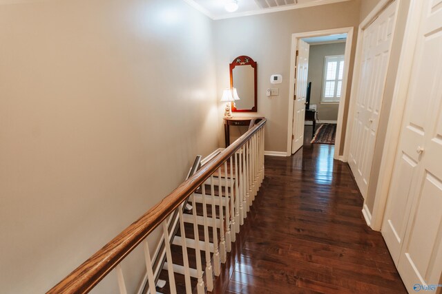 235 Inverness Dr Unit 235, Huntsville, AL 35802 - corridor featuring an upstairs landing, visible vents, baseboards, ornamental molding, and dark wood-style floors